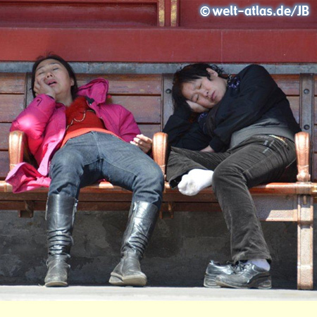 two tired young woman