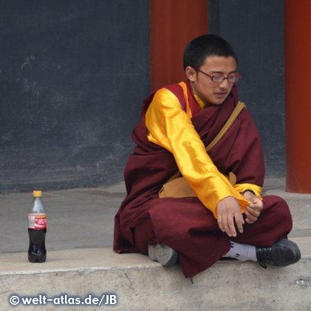 Buddhist monk sitting at Lama Temple, Beijing