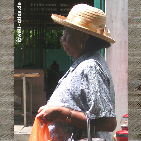 Lady coming from market, Victoria, Mahé, Seychelles