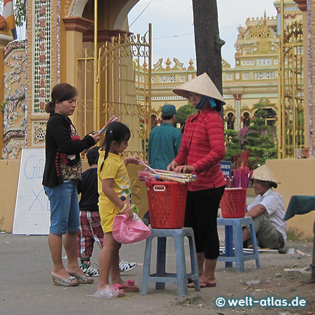 Gate to Buddhist temple with colonial facade, the Vinh Trang Pagoda, My Tho