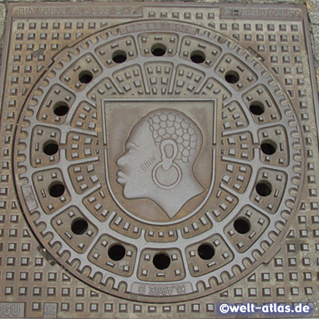 Manhole cover with Coburg Mohr, St. Mauritius in the Coats of arms  of the City of Coburg in Franconia