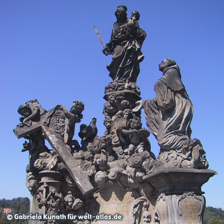 Statue on the Charles Bridge, the bridge across the Vltava River is one of the landmarks of Prague