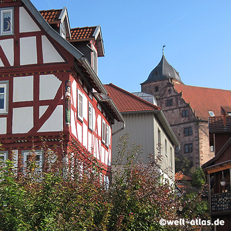 Historic timber-framed house and the castle Vorderburg