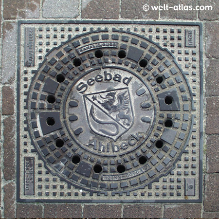 Usedom, manhole cover with Coat of Arms of seaside resort Ahlbeck