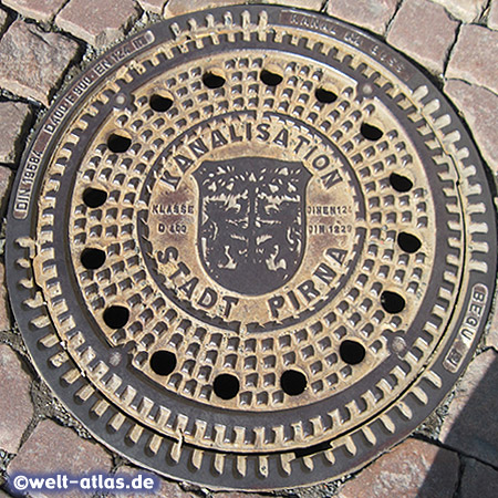 Manhole cover in Pirna with Coat of Arms