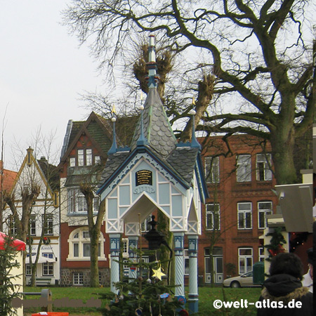 Market square with water well in Friedrichstadt