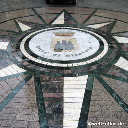 Coat of arms of Nicotera, set into the pavement