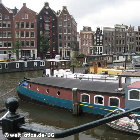 Canal with houseboats in Amsterdam