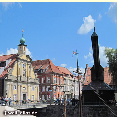 Old department store and historic harbor crane at the former Port-Ilmenau in Lueneburg