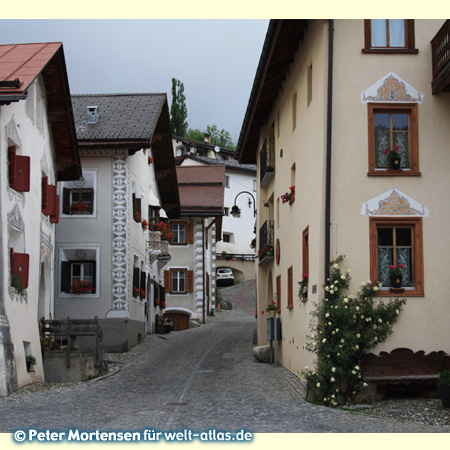 Alley in the center of Scuol at the Inn, Lower Engadine in Graubünden, Switzerland