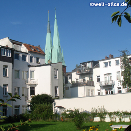Towers of Church St. Petri in Hamburg-Altona from the garden of Alfred-Schnittke-Akademie