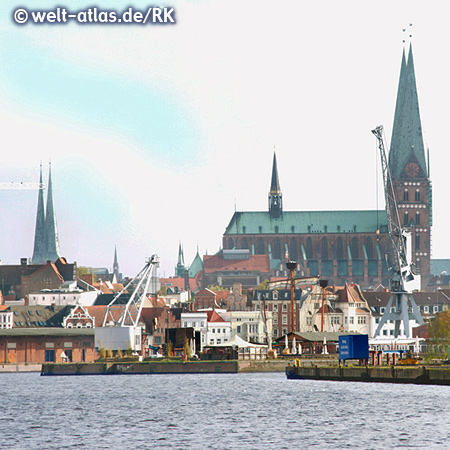 Hanseatic City of Lübeck with port facilities and the towers of the old town, on the left the Dome and on the right the Cathedral St. Mary's Church