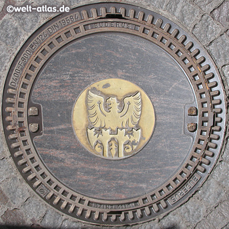 manhole cover in Merano with Coat of Arms