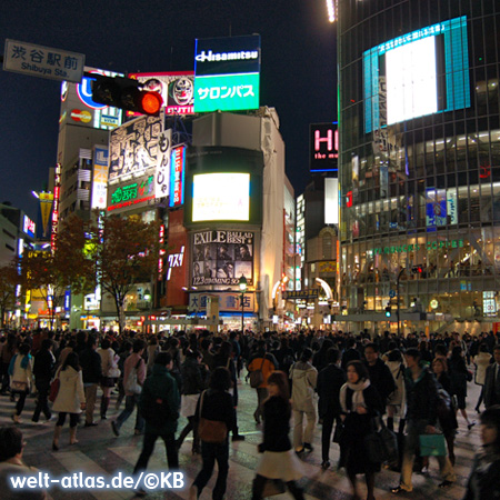 Shibuya Crossing, the busiest intersection of the world in the shopping and entertainment district of Shibuya in Tokyo