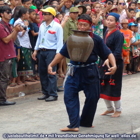 Water carrier at the ceremony for the Buddhist New Year