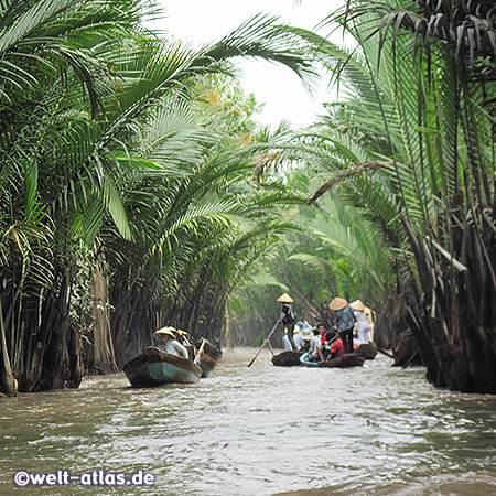 Boats in the labyrinth of islands in the Mekong Delta near My Tho
